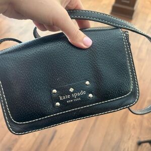 Authentic kate spade purse. Inside has little mark reflected in listing price.